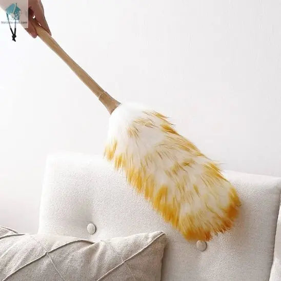 Plumeau poussière canapé en laine